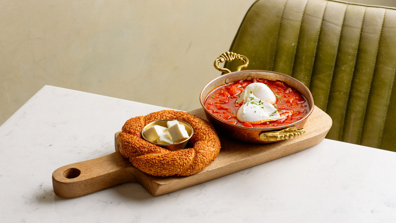 Shakshuka with poached egg and simit