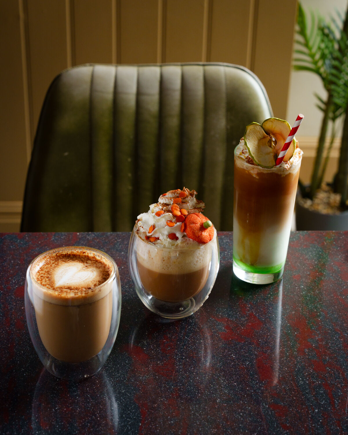 Latte and an iced drink on a table